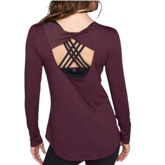 Tops - Athleta Long sleeve flex light twist open back top. Color burgundy